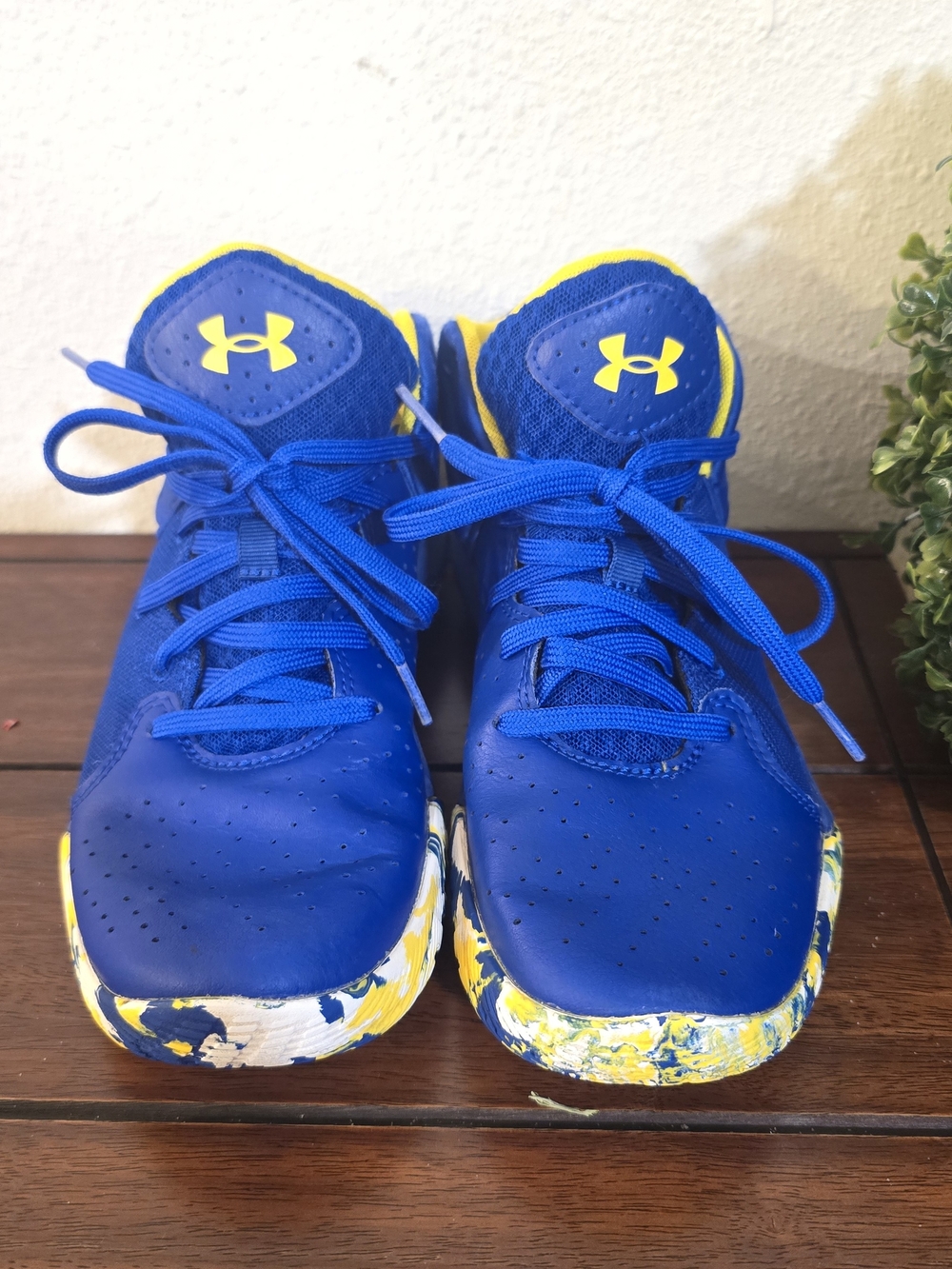 Under Armour Kids' Blue Basketball Shoes with Yellow Accents